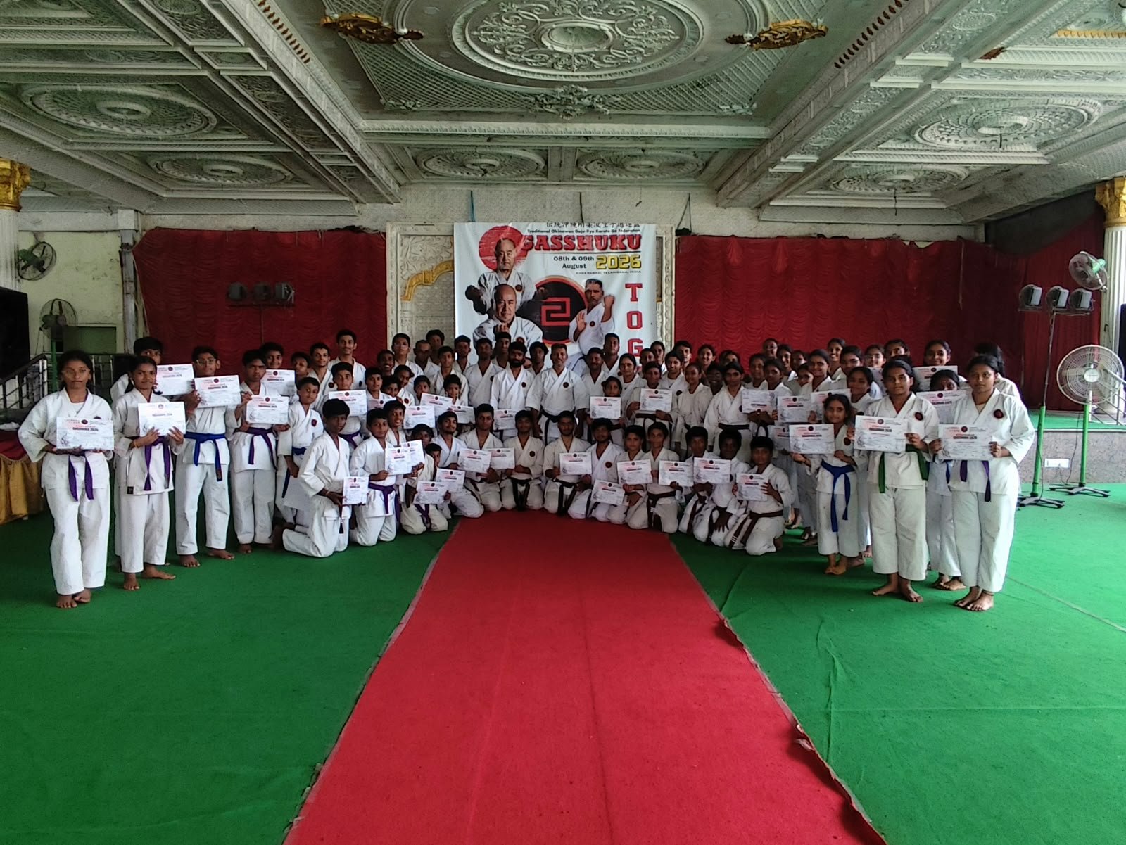 Karate practitioners from across India displaying completion certificates after the 2026 TOGKF Gasshuku in Hyderabad
